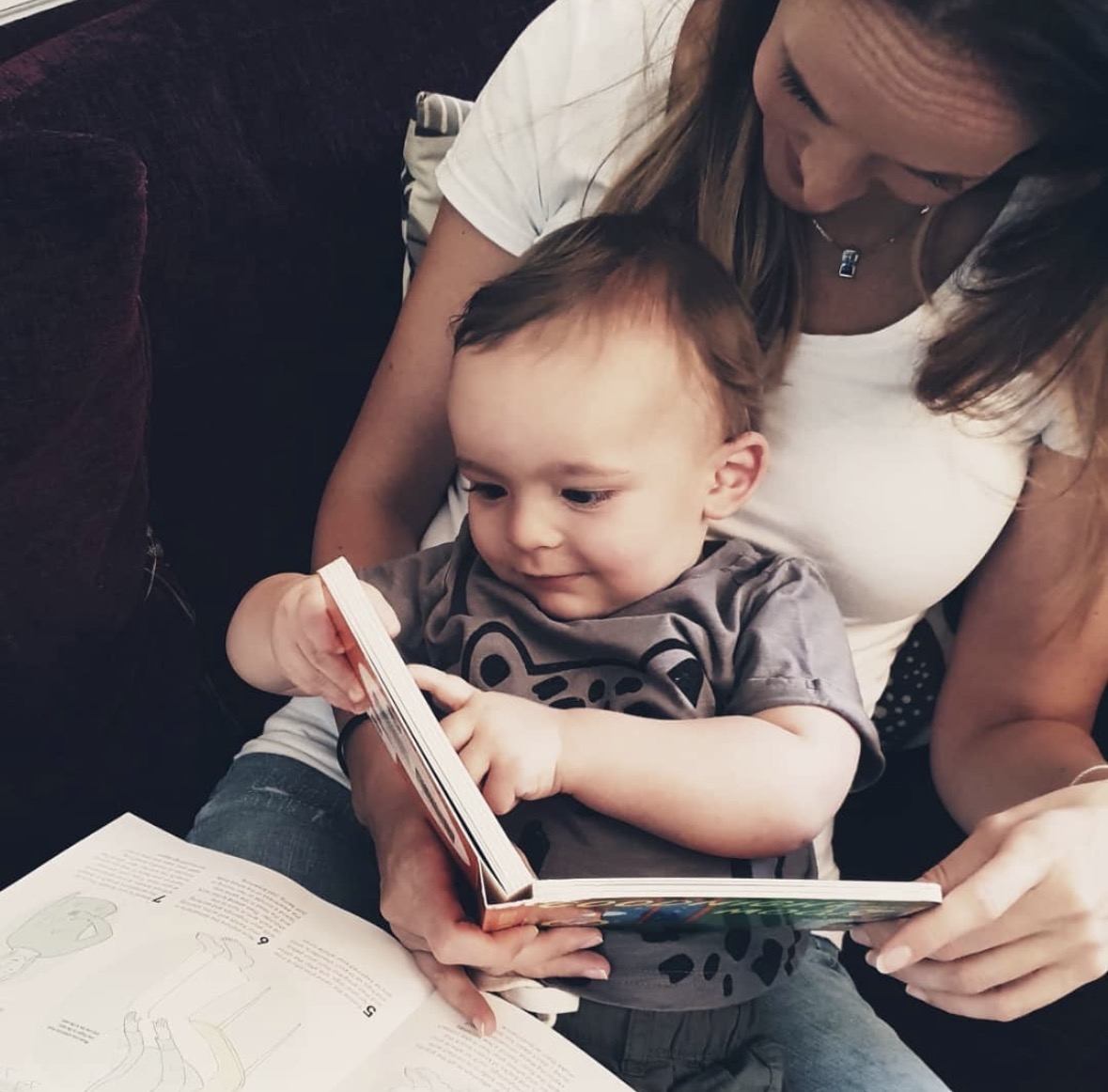 Claire Marshall reading a book with her son Jack when he was a toddler